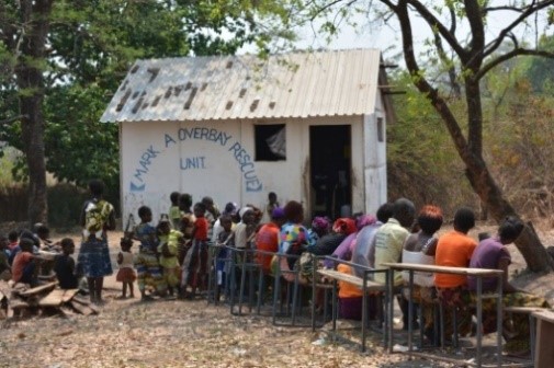 children wait for treatment